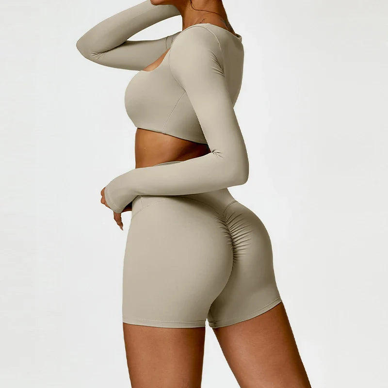 Beige long-sleeve crop top and ruched high-waist shorts training set, side view