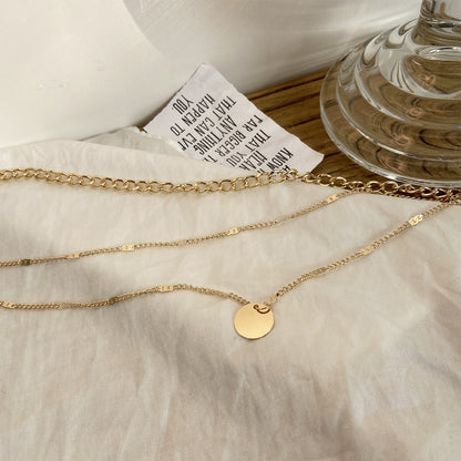 Women's Layered Disc Pendant Necklace (photo 3)