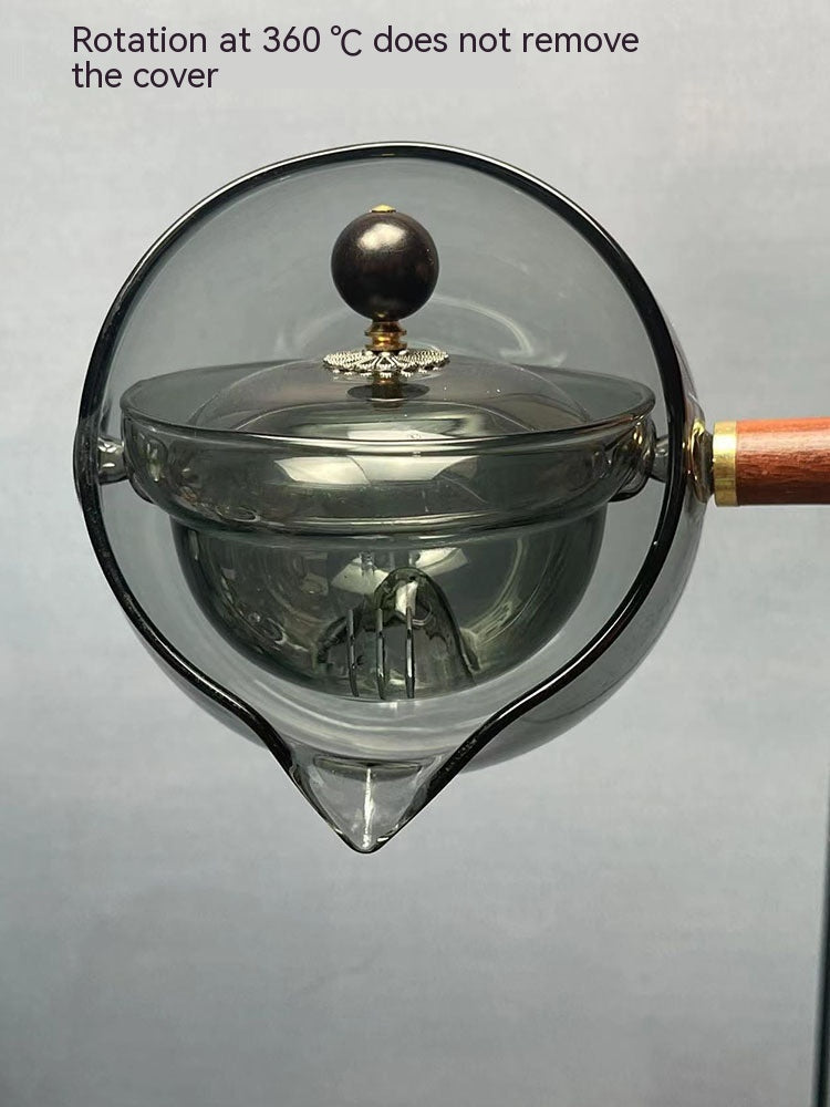 Rotating Glass Teapot with Infuser and Wooden Handle (photo 9)