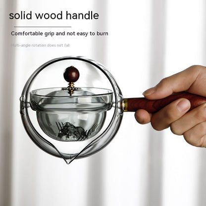 Rotating Glass Teapot with Infuser and Wooden Handle (photo 4)