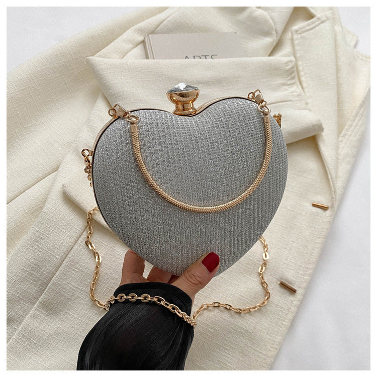 Shiny Heart-Shaped Evening Clutch with Chain (photo 10)