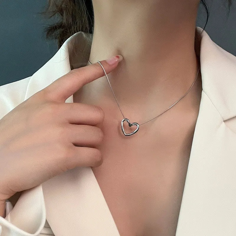 Twisted Hollow Heart Pendant Necklace (photo 3)