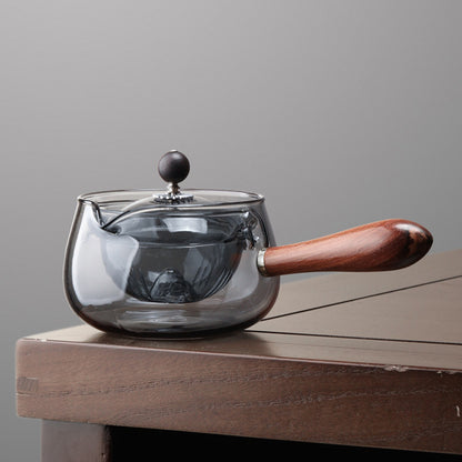 Rotating Glass Teapot with Infuser and Wooden Handle (photo 13)