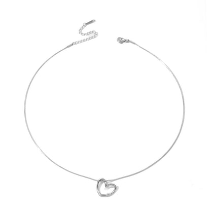 Twisted Hollow Heart Pendant Necklace (photo 7)