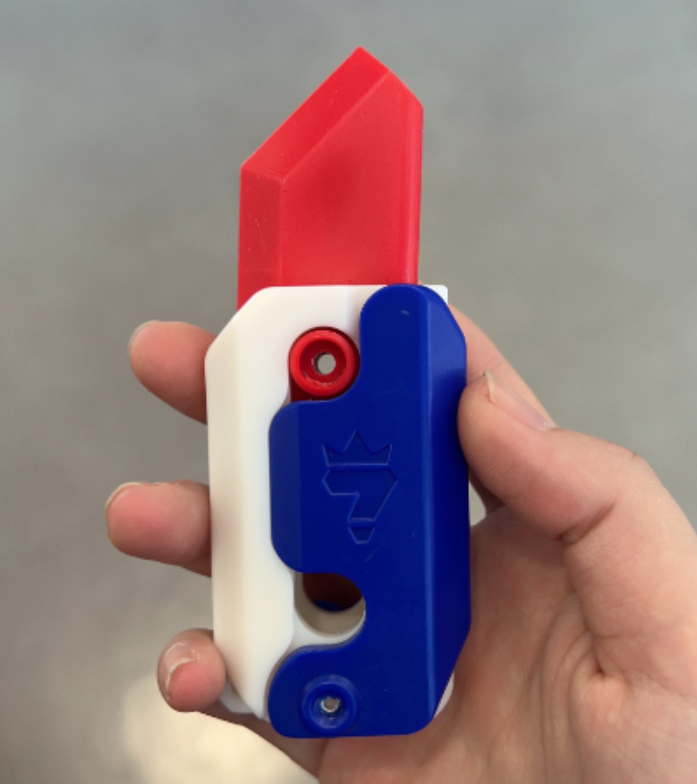3D-Printed Carrot-Shaped Fidget Toy with Retractable Plastic Blade (photo 10)
