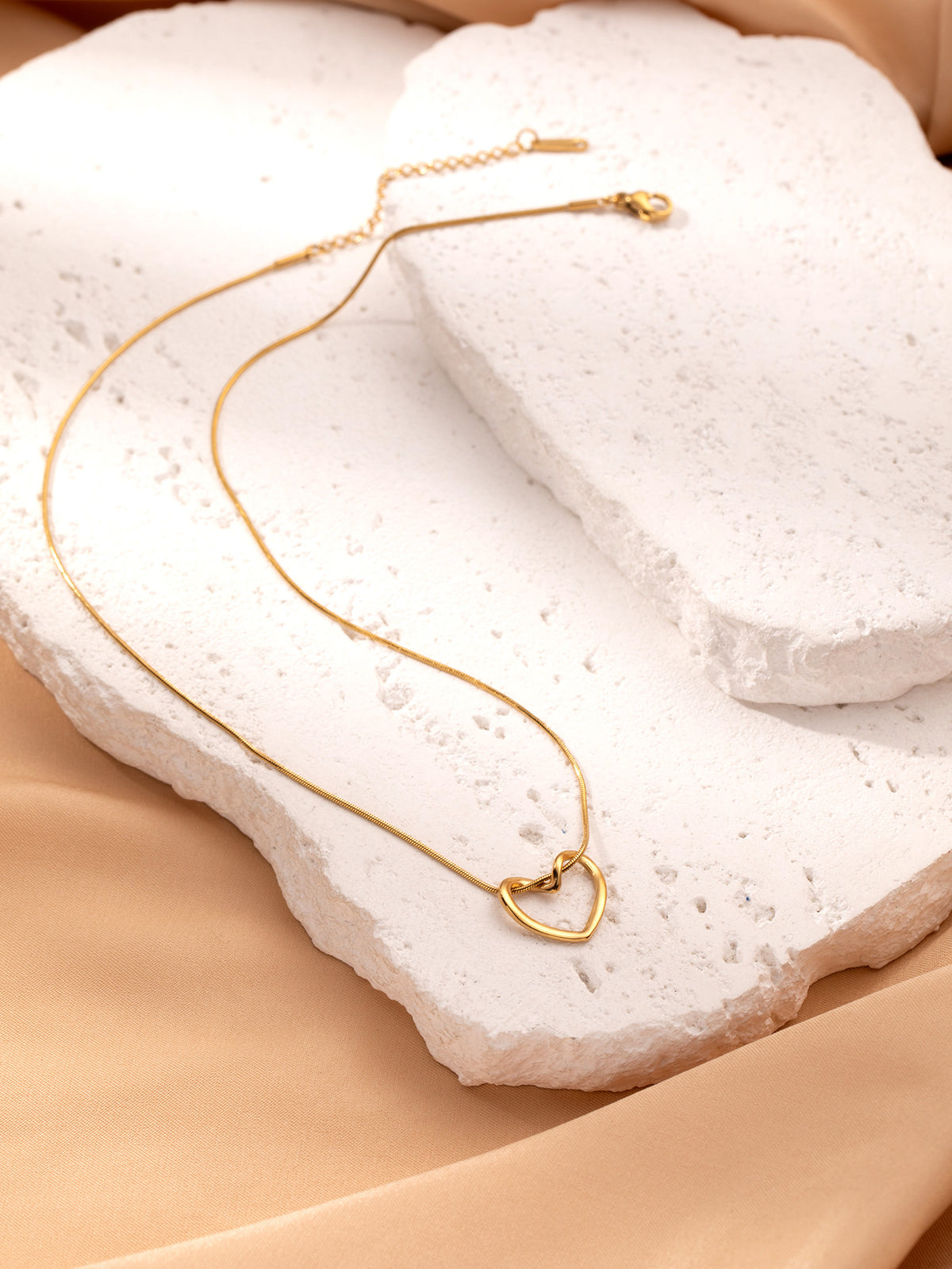 Twisted Hollow Heart Pendant Necklace (photo 9)