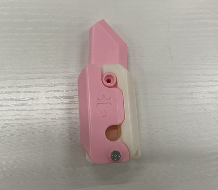 3D-Printed Carrot-Shaped Fidget Toy with Retractable Plastic Blade (photo 21)