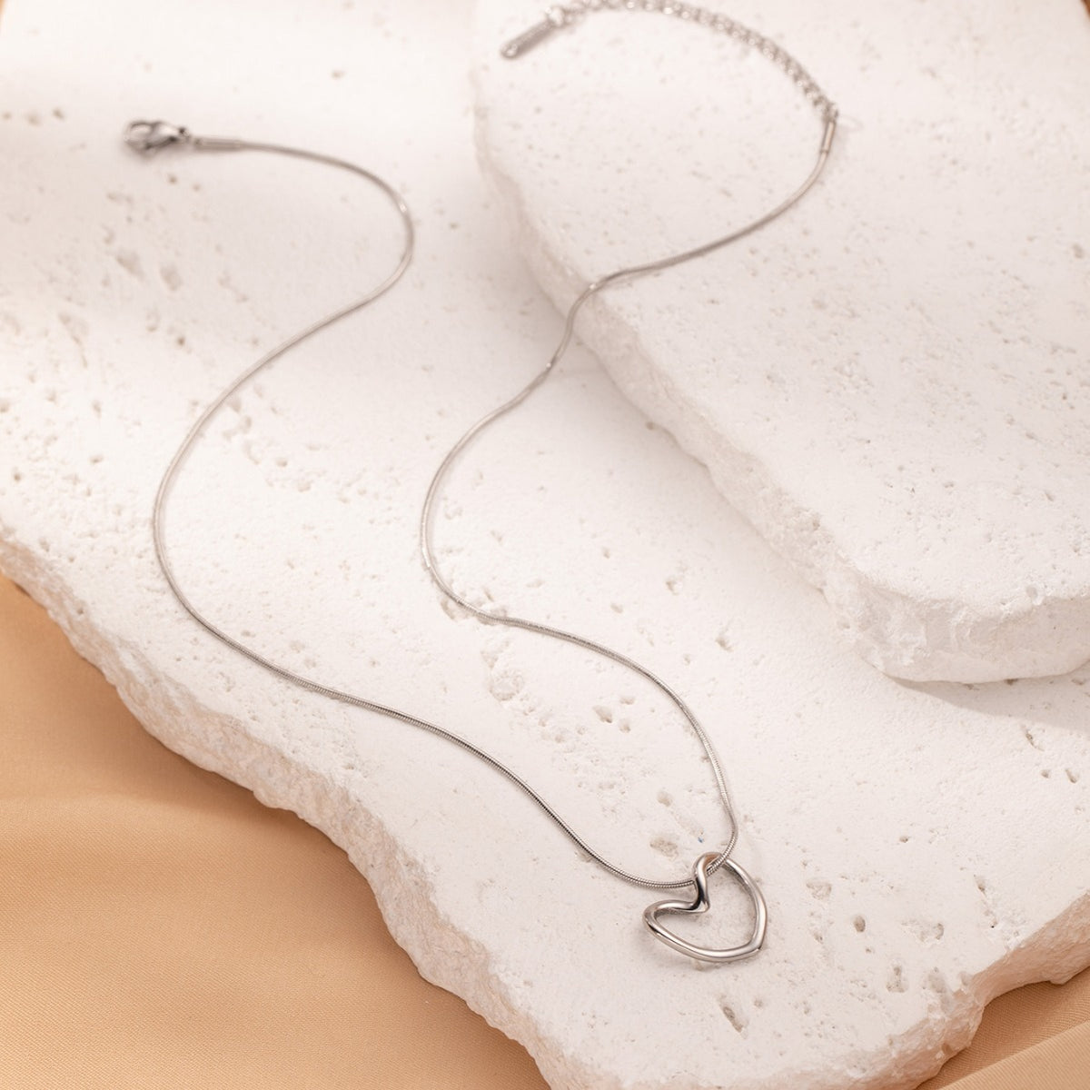Twisted Hollow Heart Pendant Necklace (photo 6)