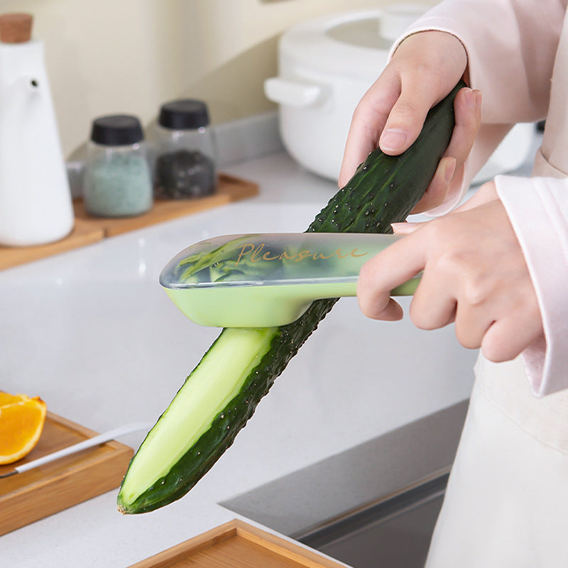 Vegetable and Fruit Peeler with Built-In Storage Tube (photo 2)