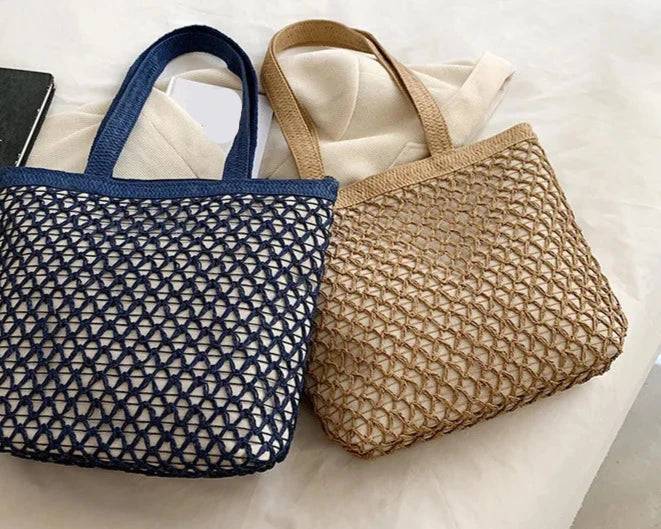 Two woven tote bags, one navy blue and one natural beige