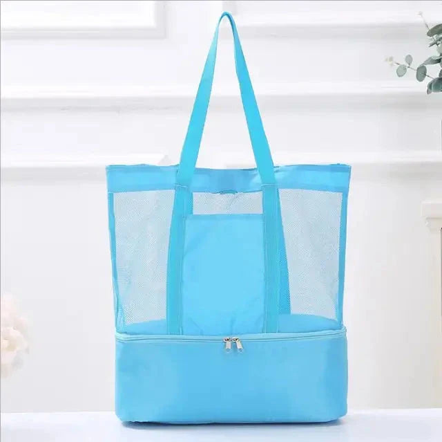 Sky blue mesh tote bag with a zippered bottom compartment, front view