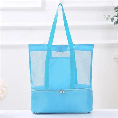 Sky blue mesh tote bag with a zippered bottom compartment, front view