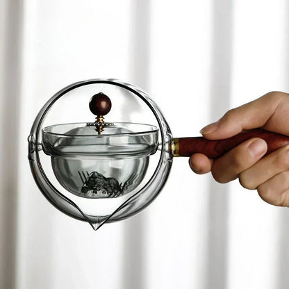 Rotating Glass Teapot with Infuser and Wooden Handle (photo 10)