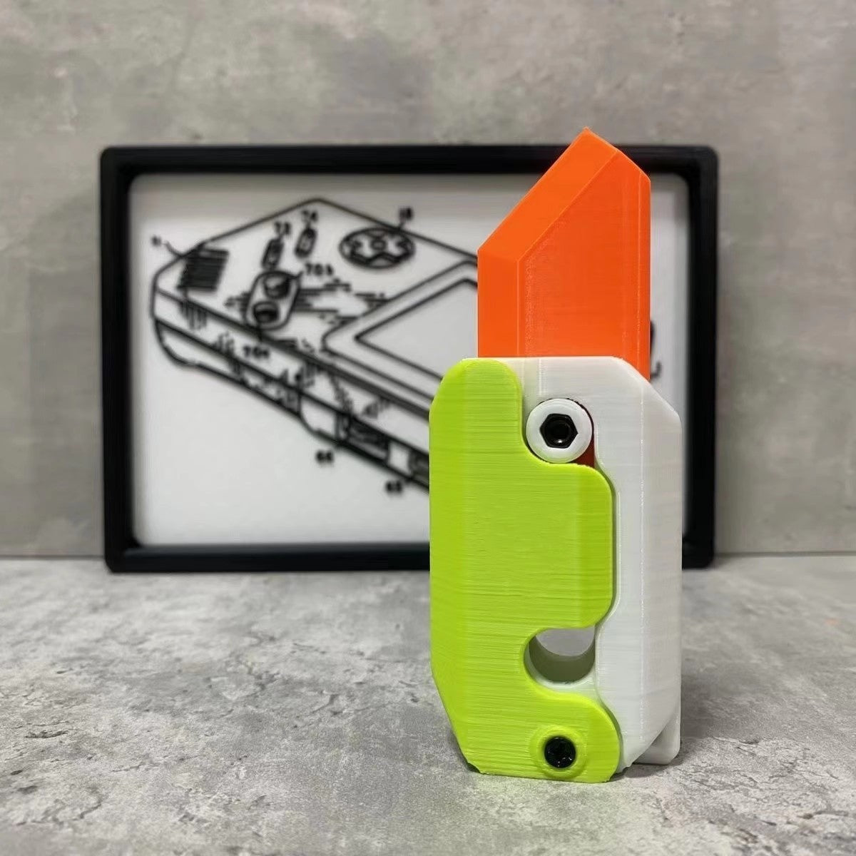 3D-Printed Carrot-Shaped Fidget Toy with Retractable Plastic Blade (photo 3)