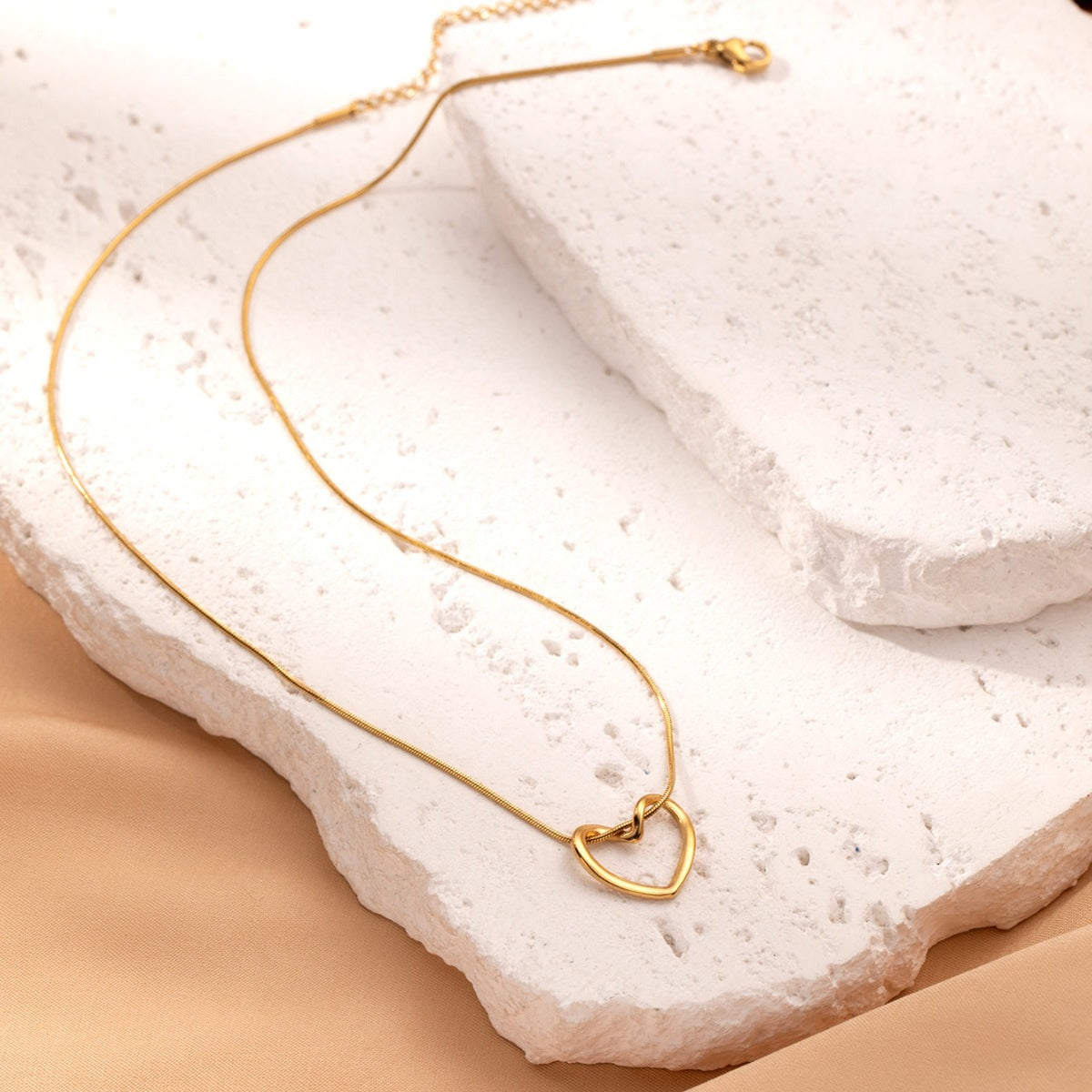 Twisted Hollow Heart Pendant Necklace (photo 5)