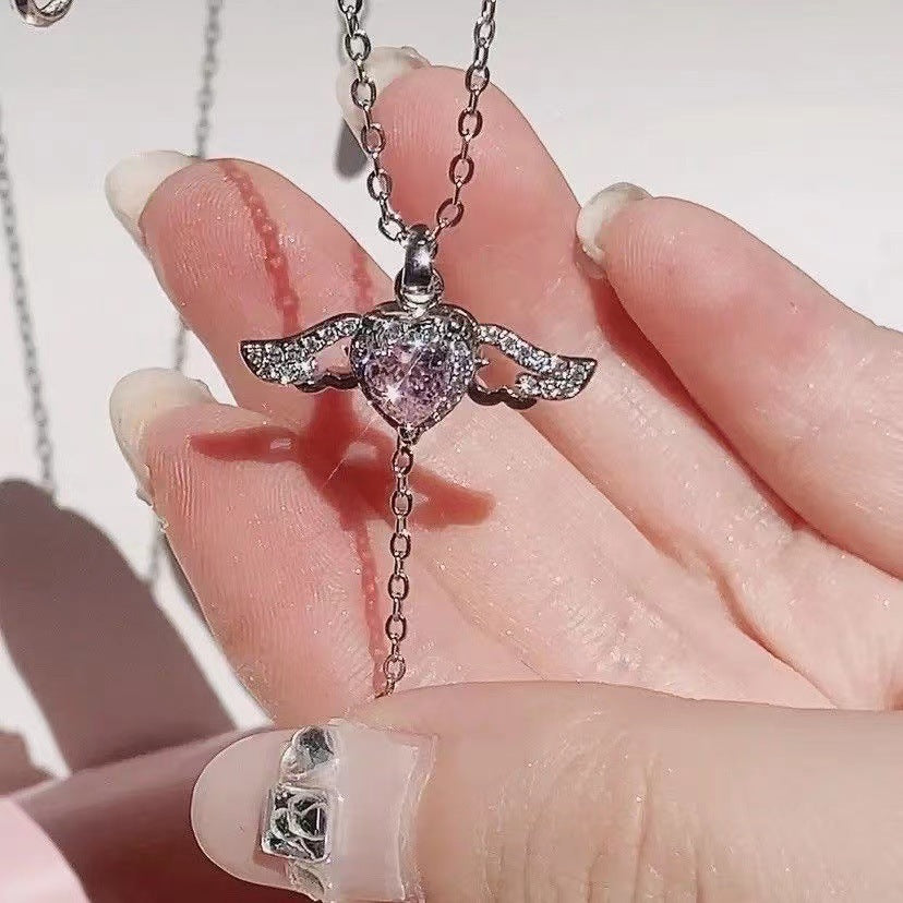 Cupid Heart Pendant Necklace with Moving Wings (photo 5)