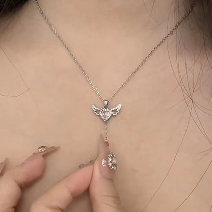 Cupid Heart Pendant Necklace with Moving Wings (photo 4)
