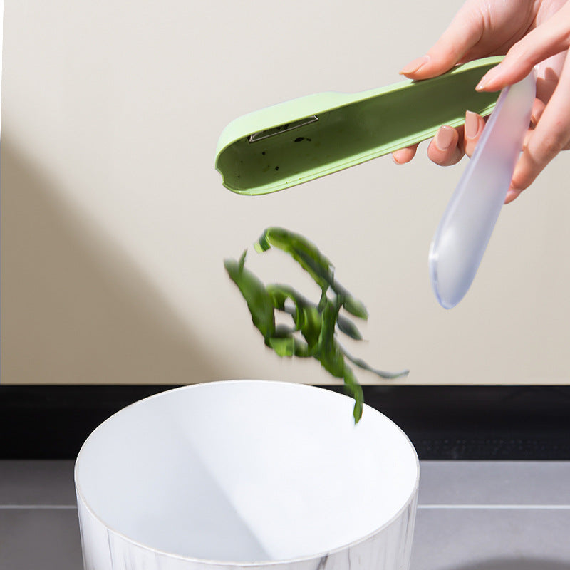 Vegetable and Fruit Peeler with Built-In Storage Tube (photo 5)