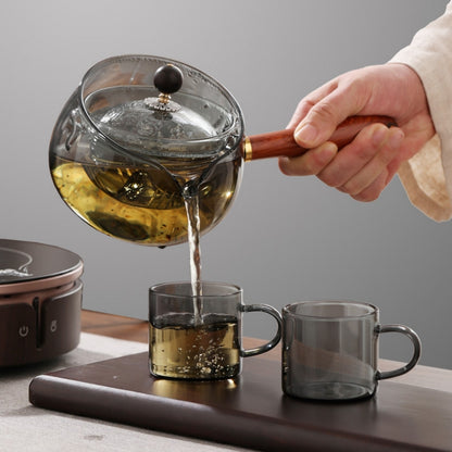 Rotating Glass Teapot with Infuser and Wooden Handle