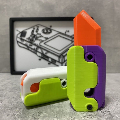 3D-Printed Carrot-Shaped Fidget Toy with Retractable Plastic Blade (photo 2)