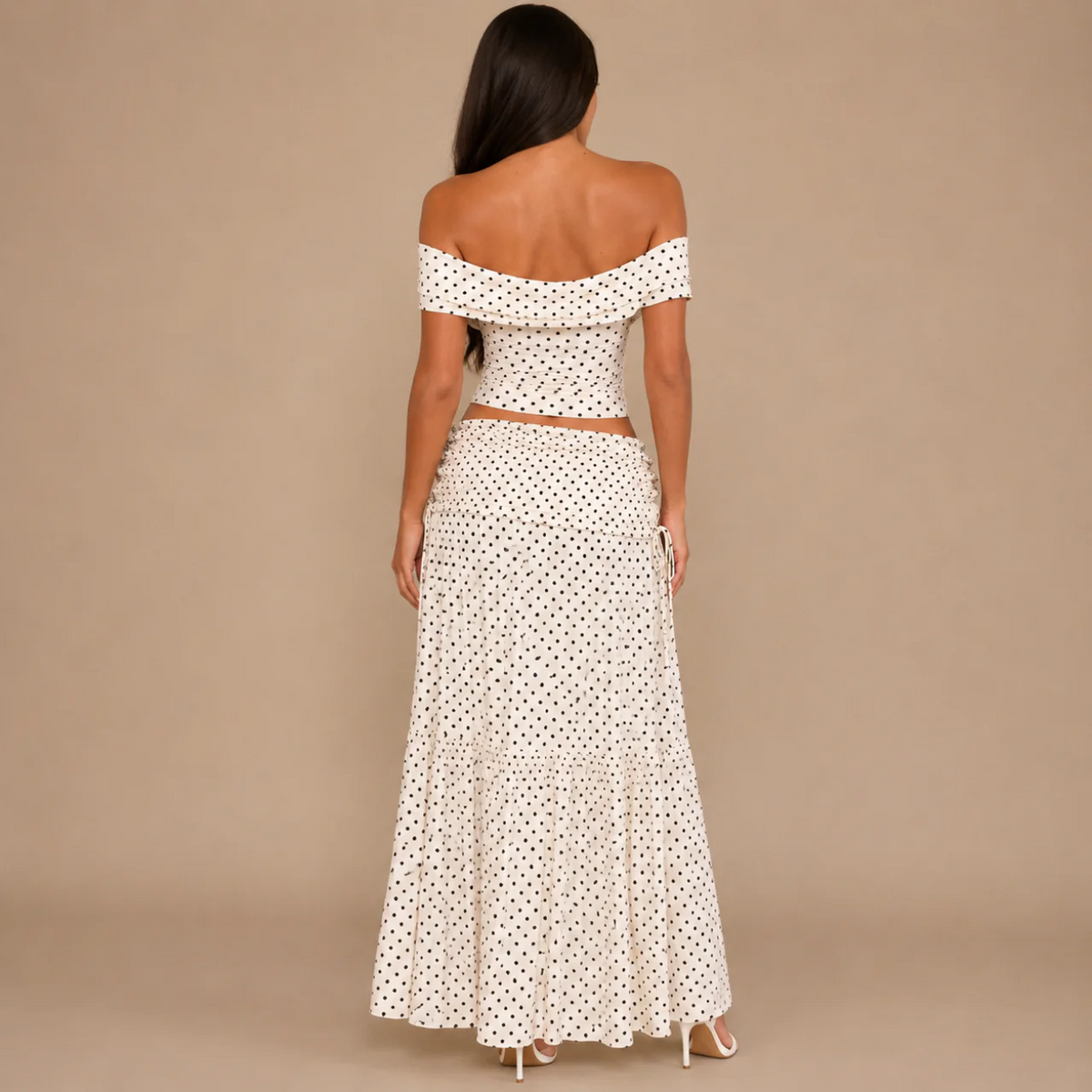 Back view of the cream polka dot off-the-shoulder top and maxi skirt set