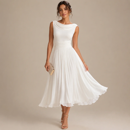 Woman wearing a white sleeveless chiffon midi dress with a flared pleated skirt, front view