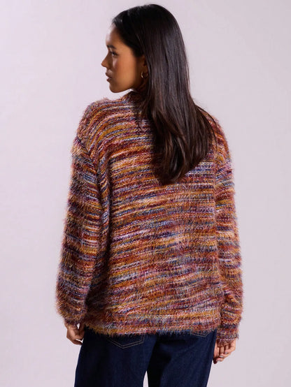 Back three-quarter view of the multicolor rust striped fuzzy knit cardigan
