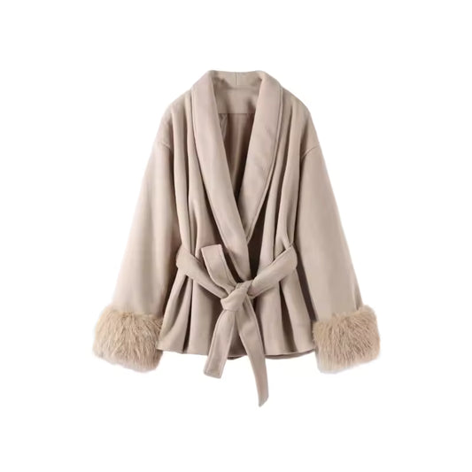 Beige wrap coat with a tie belt and fluffy cuffs, front view on a white background