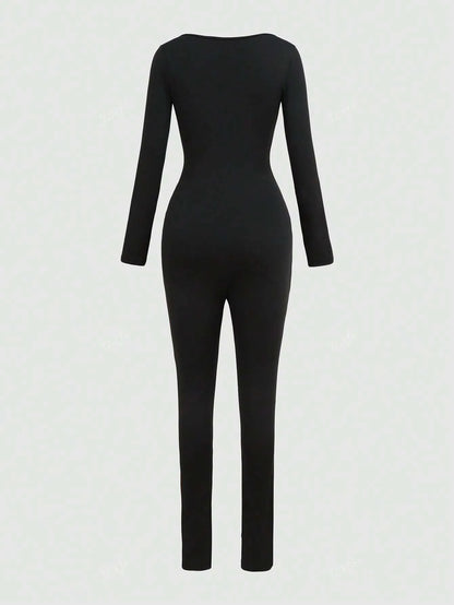 Black long-sleeve scoop-neck fitted jumpsuit, back view