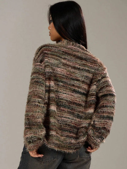 Back view of the brown and grey striped oversized knit cardigan